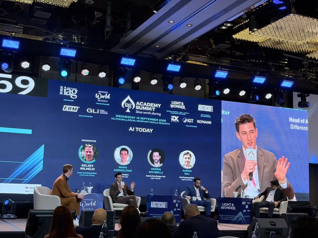 Mana Azizsoltani speaking on a panel at the IAG Academy Summit in Manila