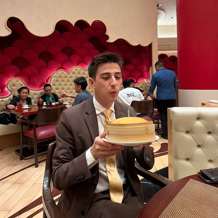 Mana Azizsoltani blowing out birthday candles in Manila