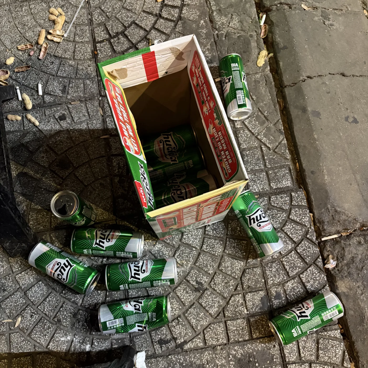 Empty beer case and Huda beer cans after a Monday night out in Da Nang, Vietnam